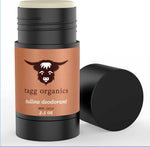 Deodorant stick with 'tagg organics' branding on a white background