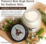 Jar of tagg organics whipped tallow cream on a wooden board with greenery and flowers.