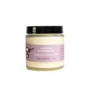 Jar of lavender and chamomile whipped tallow cream with a black lid on a white background