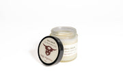 Jar of Bull Balm with a black lid on a white background