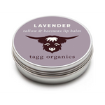 Lavender tallow & beeswax lip balm tin with tagg organics branding on a white background