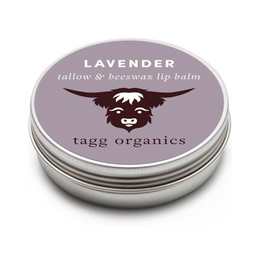 Lavender tallow & beeswax lip balm tin with tagg organics branding on a white background