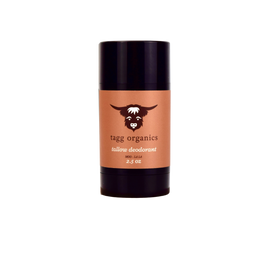 Deodorant stick with 'tagg organics' branding on a white background