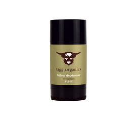 Deodorant stick with a black cap and green label on a white background