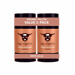 Two tallow deodorant containers from tagg organics on a white background