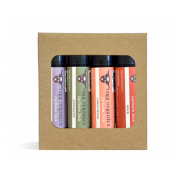 Set of four lip balm sticks in a cardboard packaging with visible brand name.
